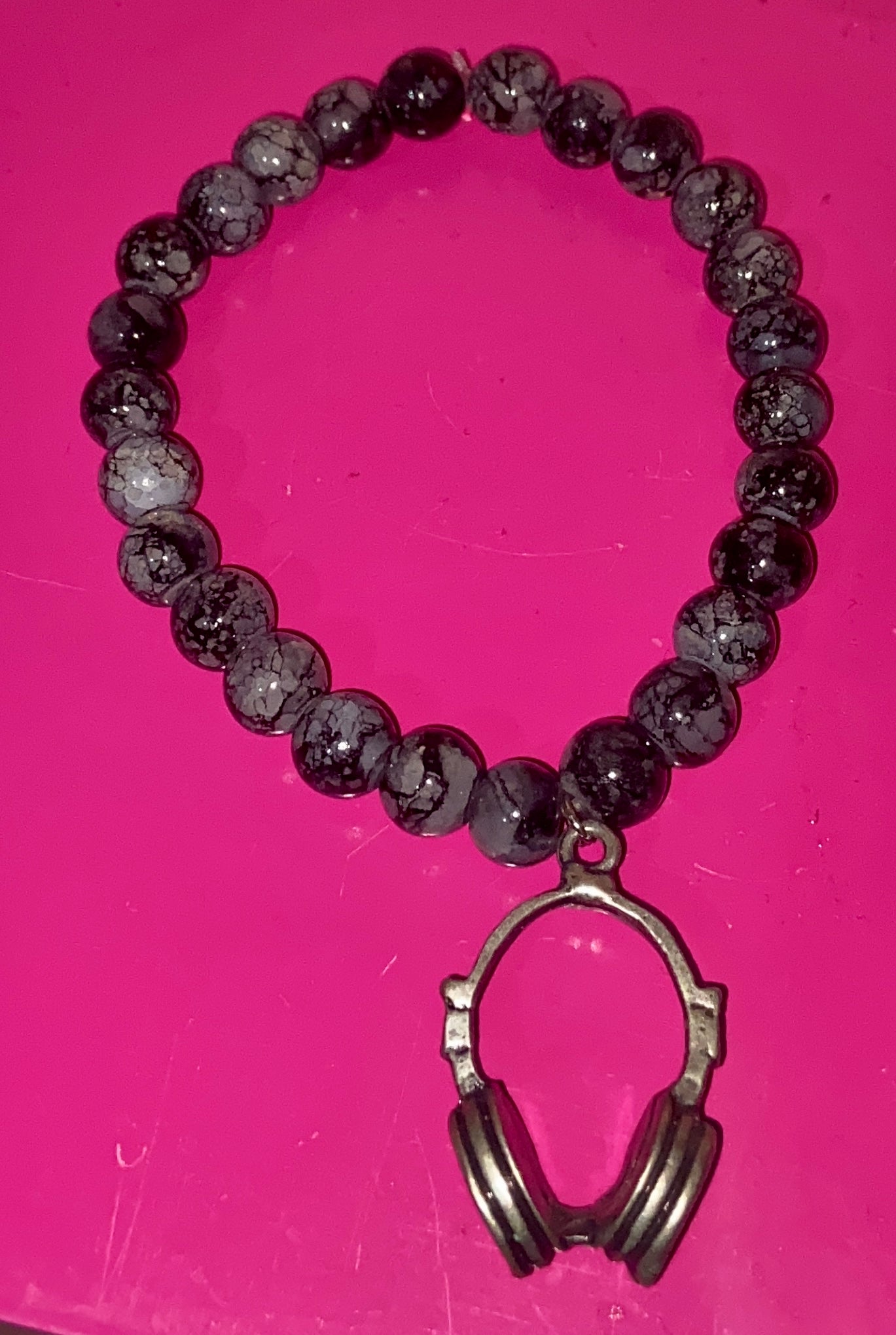 Head phones black beaded bracelet