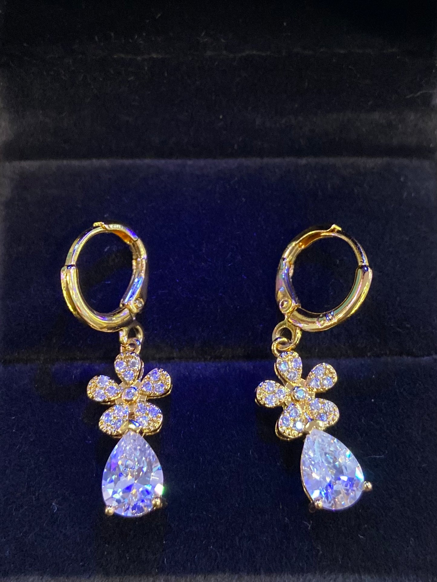 Clear cz floral huggie earring