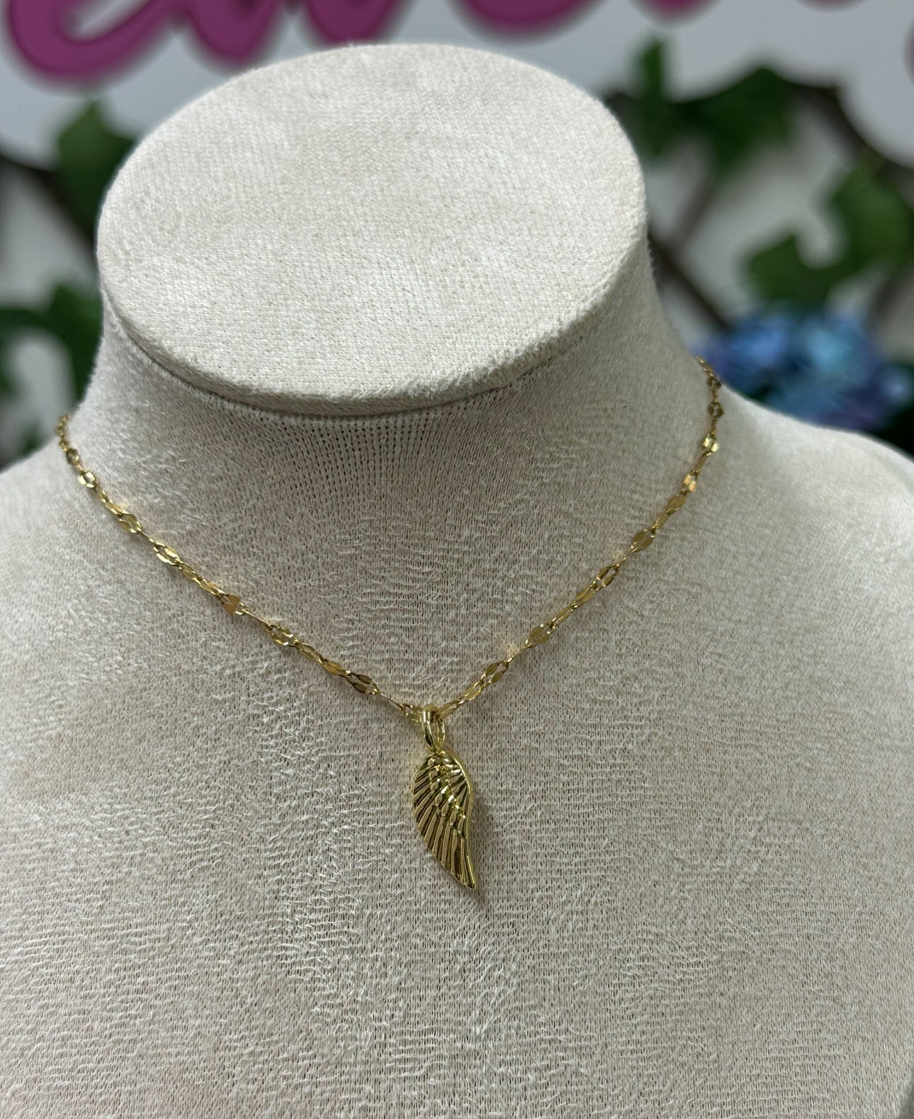 Golden stainless steel wing necklace