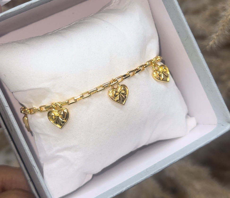 Gold plated ribbon of love bracelet