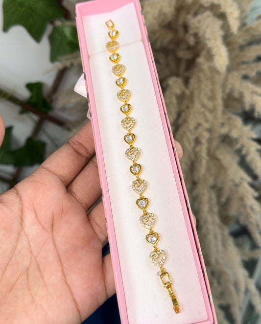 Gold cz heart tennis bracelet